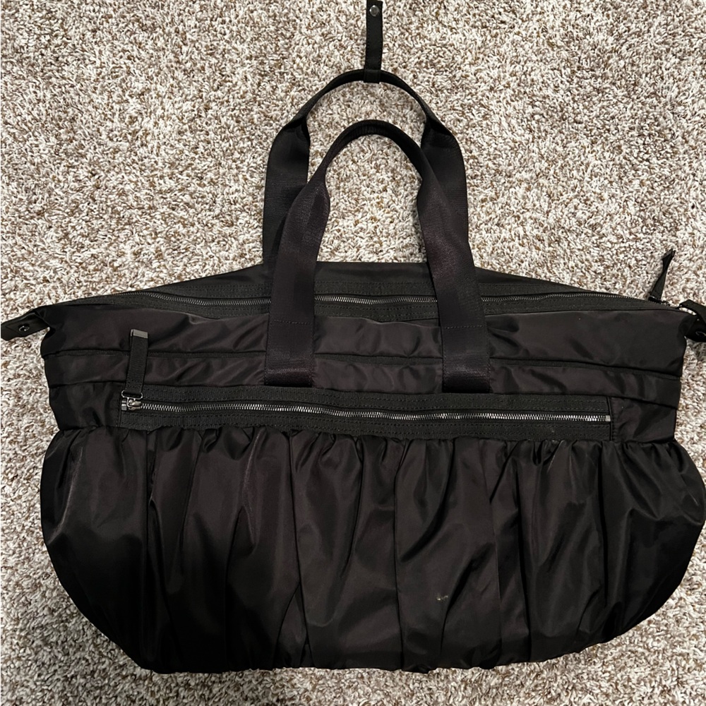 Cara x Athleta duffle bag